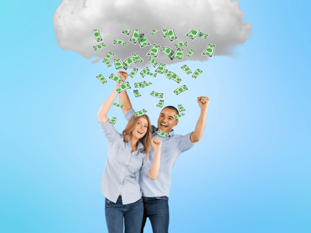 Two business owners cheering as it rains money from a cloud above them