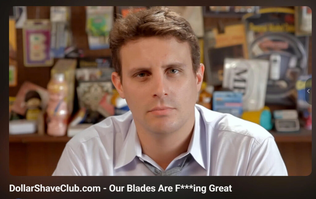 A thumbnail of a video featuring the Dollar Shave Club founder calling out how ridiculous overpriced razors are